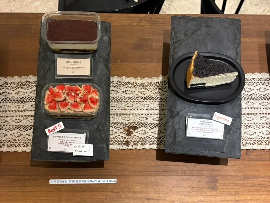 Cheesecakes and tiramisu displayed in the showcase