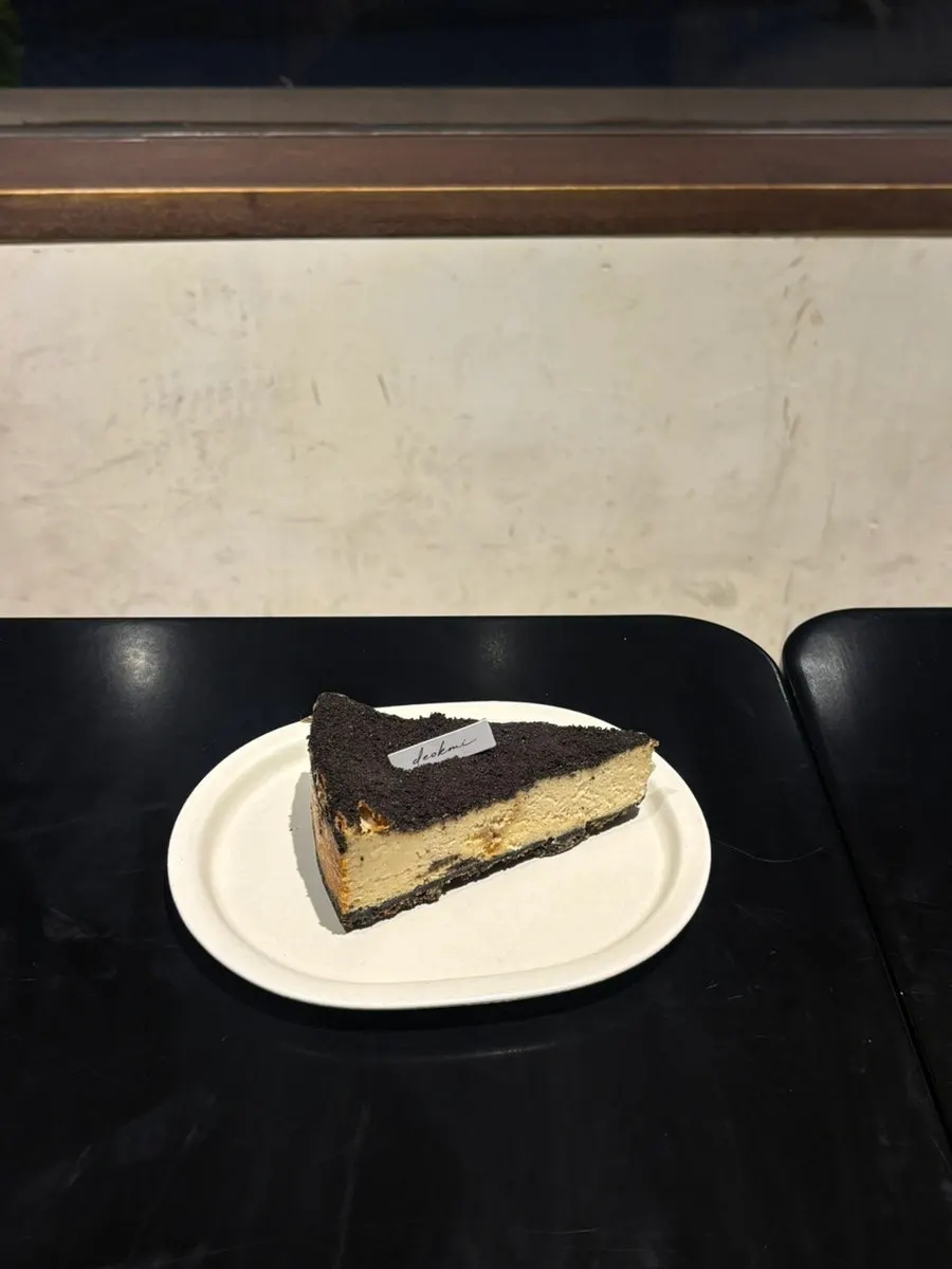 A slice of Deokmi's signature Oreo cheesecake