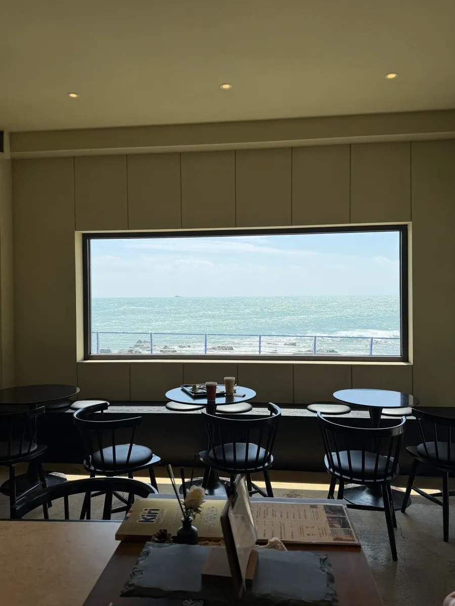 Ocean view seen from a window seat in the main building