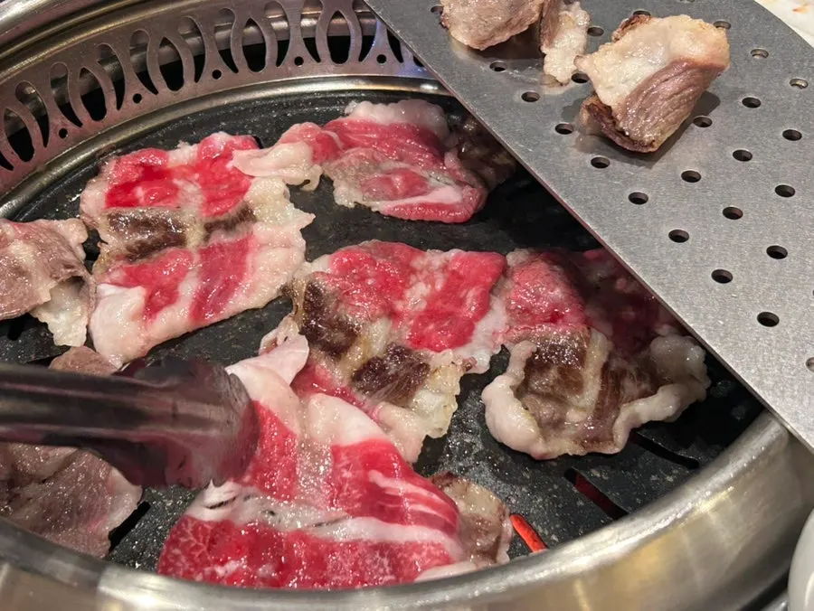 A piece of hanwoo with pickled chili pepper
