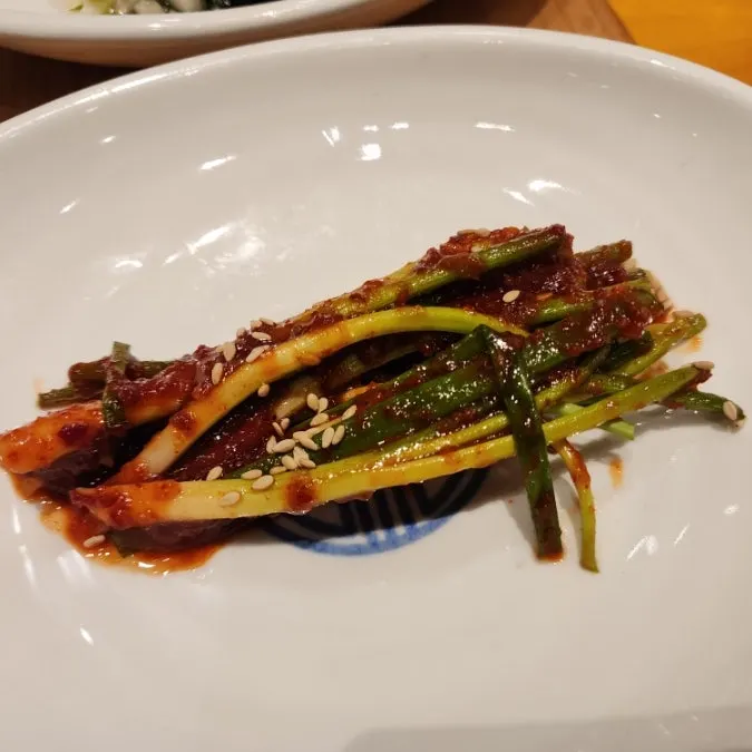 Grilled mackerel eaten with rice