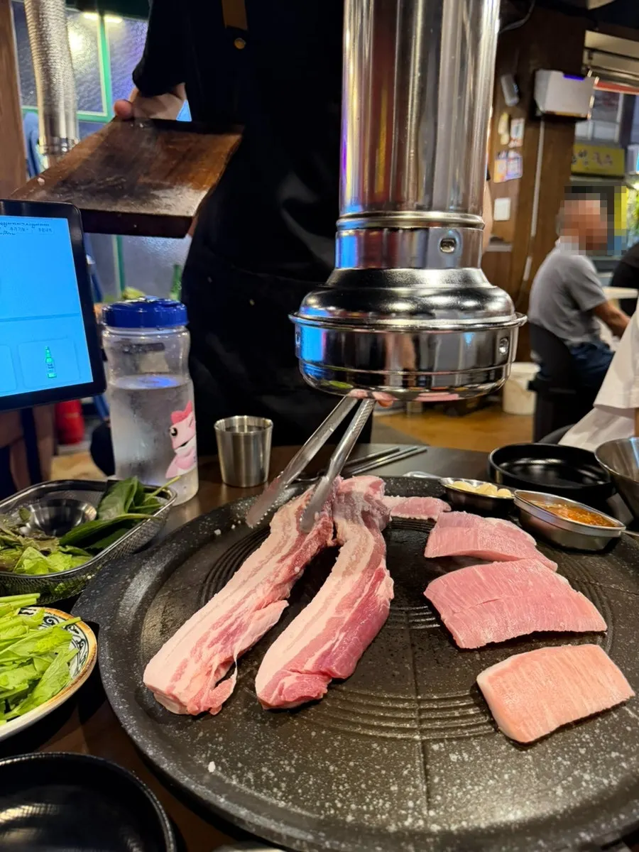 Pork belly and pork jowl served on one platter