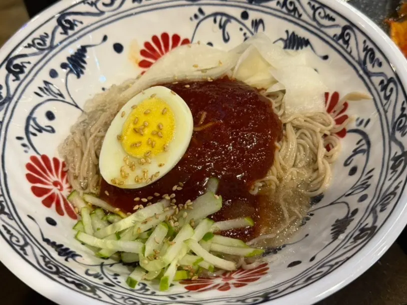 A bowl of rice served with a slice of Spam
