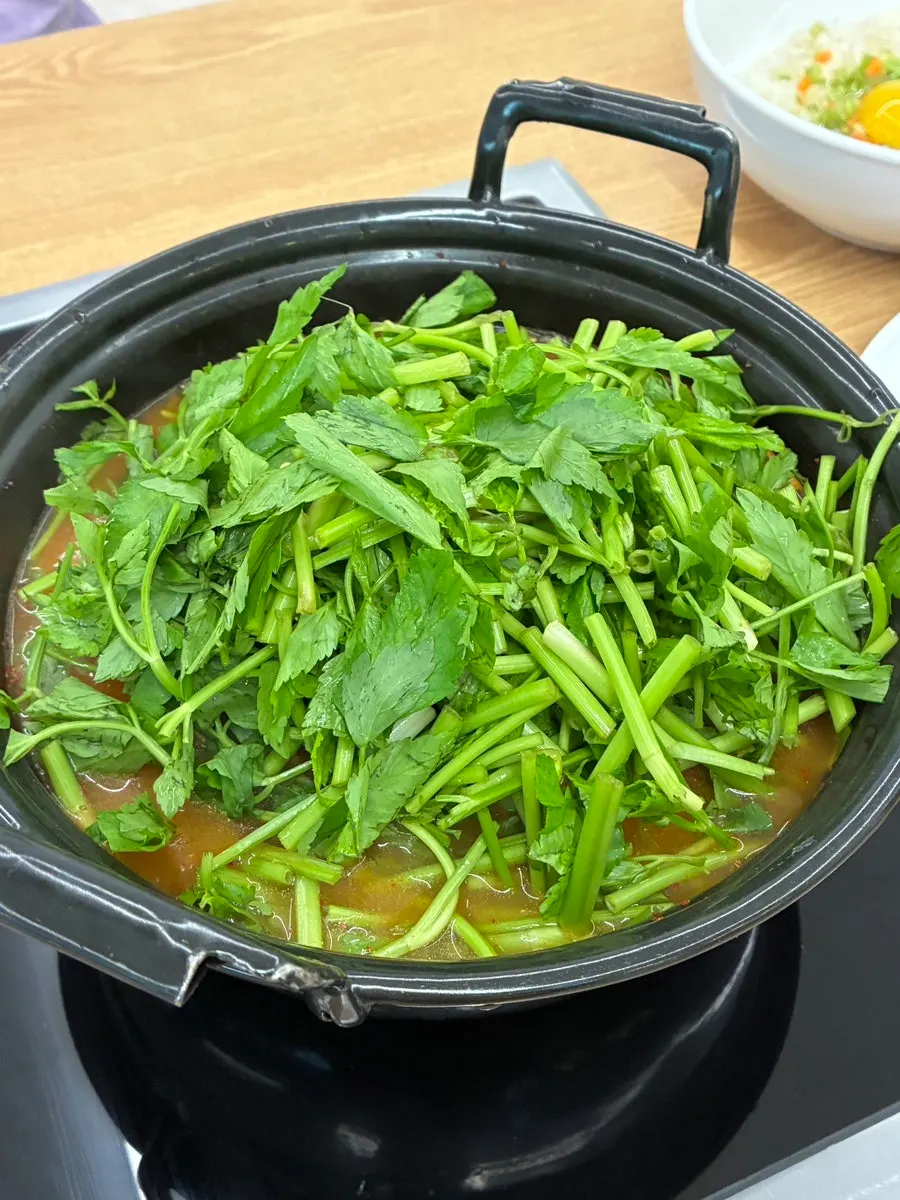 Shabu-shabu vegetable plate loaded with minari