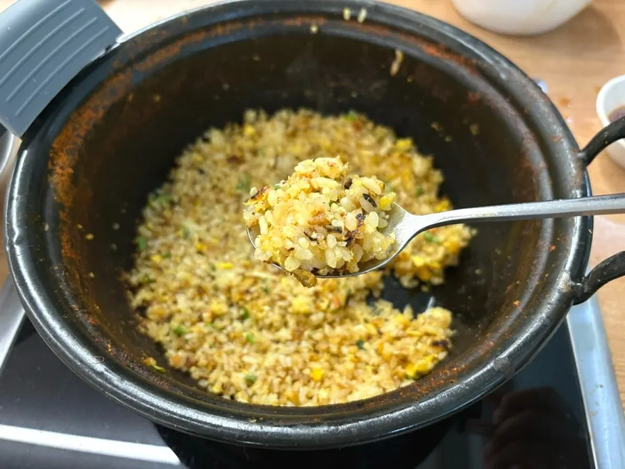 Fried rice dipped into the spicy broth