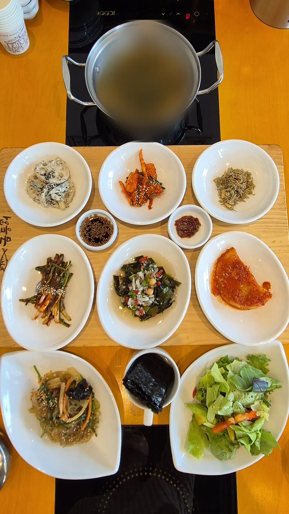 Two servings of wood-fired grilled mackerel and cockle salad ordered at the counter