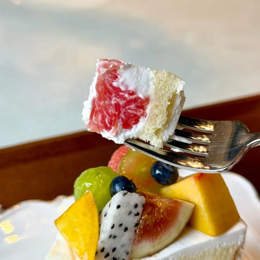 Cross-section of a bitten fruit cake slice