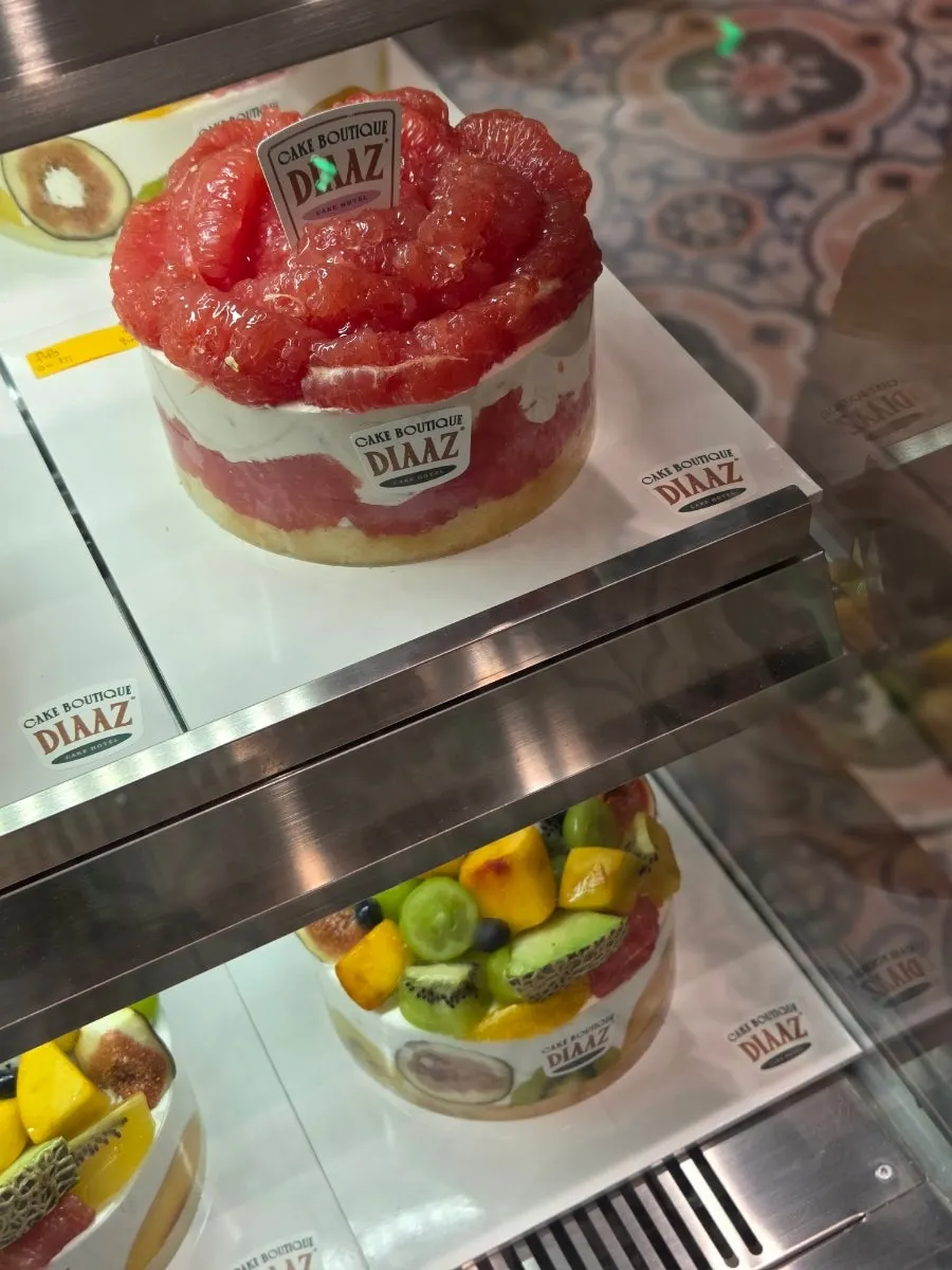 Whole cake piled high with fruit
