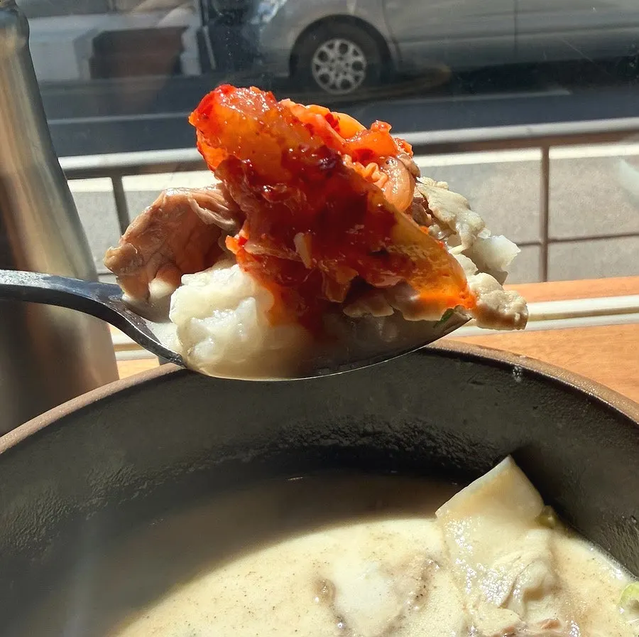 Rice mixed into the rich Dimideun gomtang