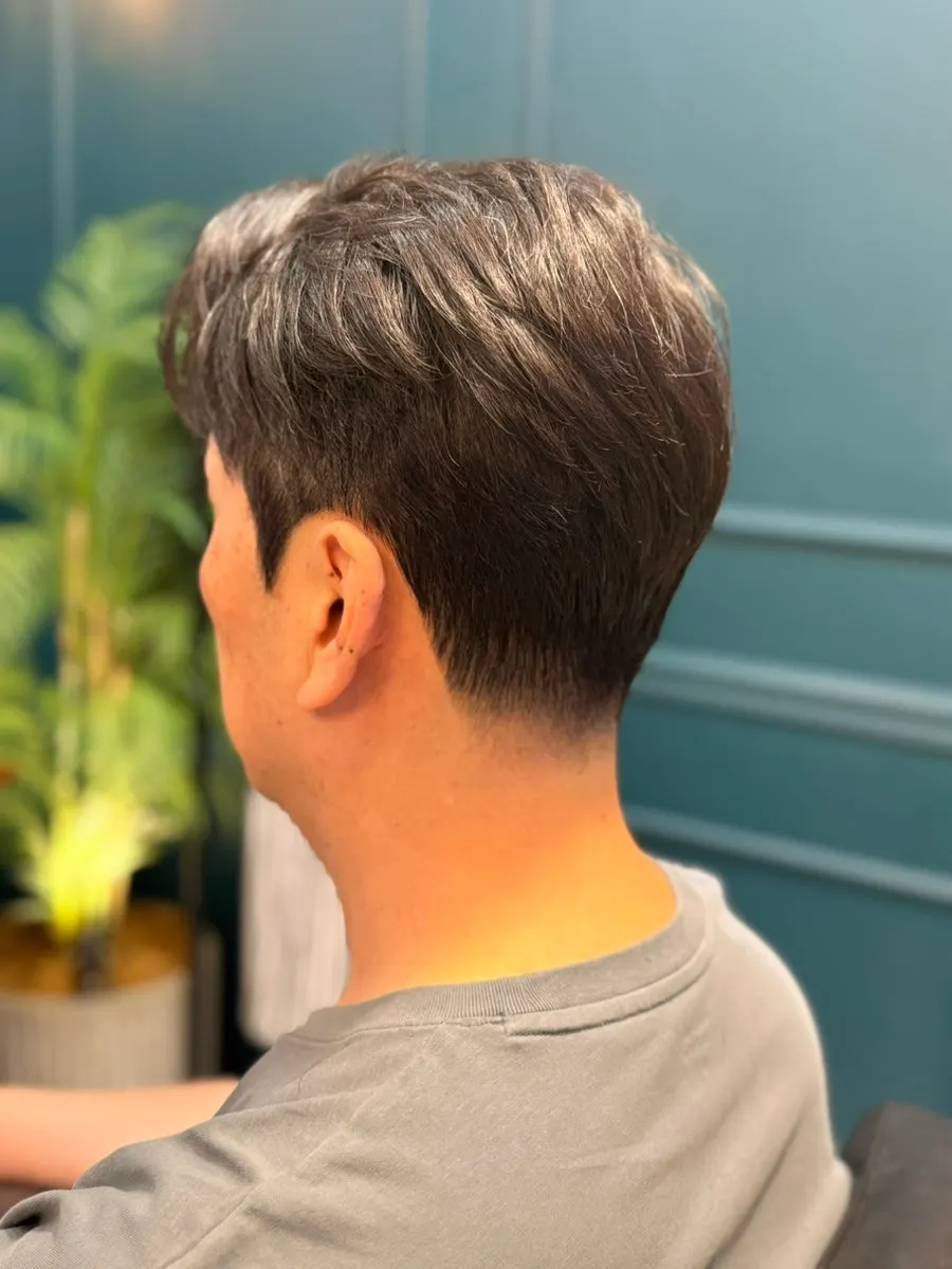 Finished men's hairstyle after the classic cut