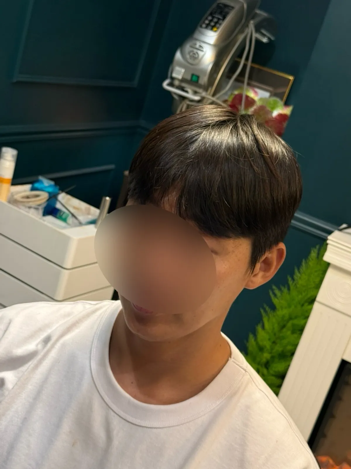 Down perm tidying side hair to suit the head shape