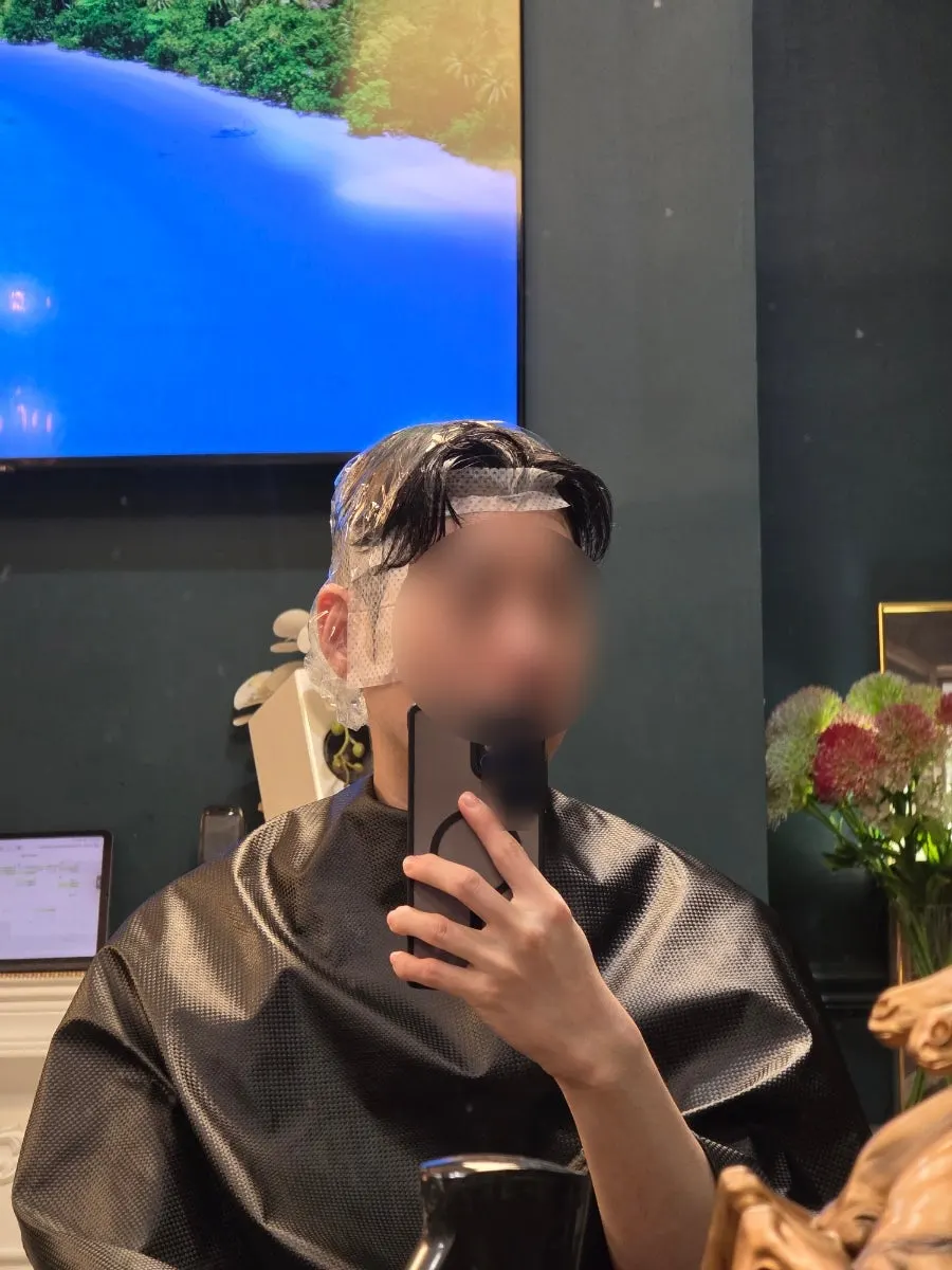 Hair tidied with a Ga-il cut and side down perm