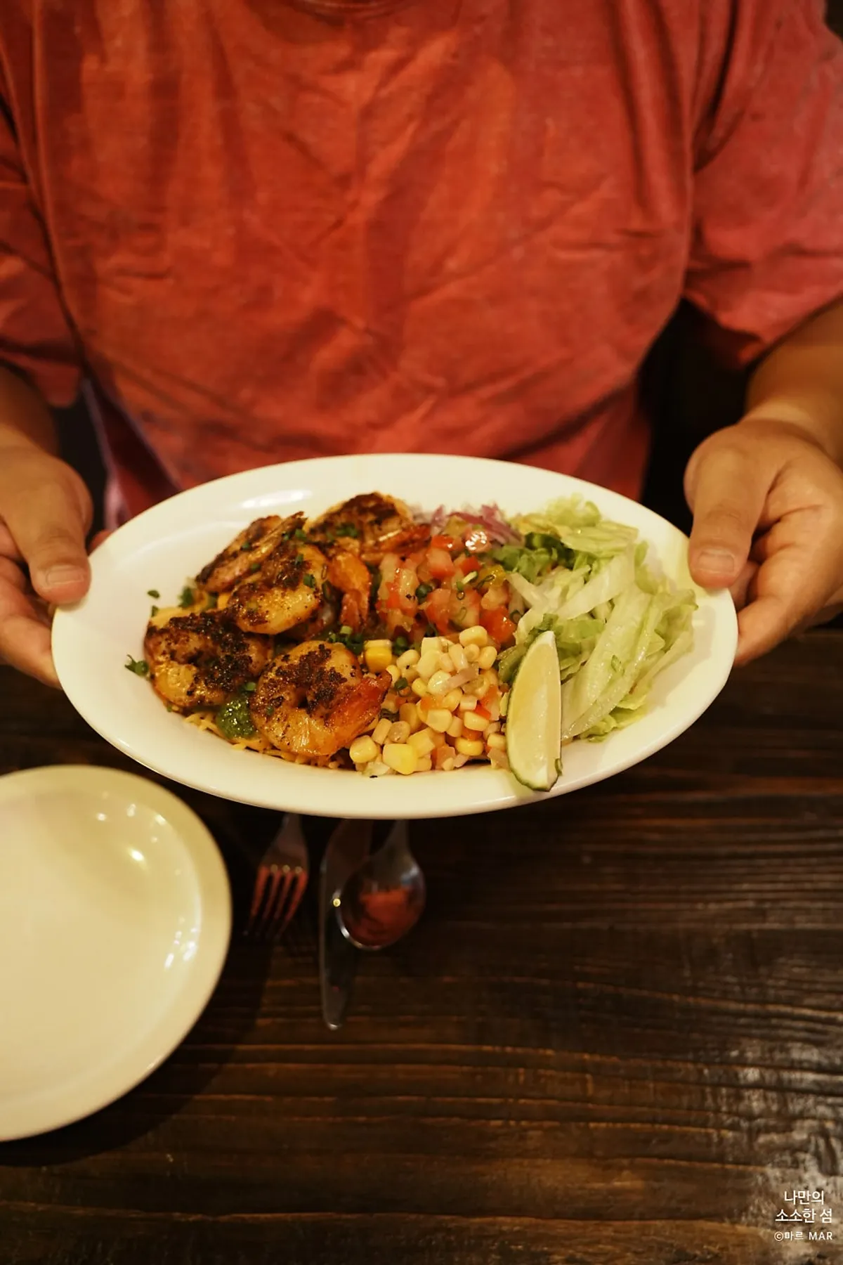 Cajun shrimp served with remoulade and Southern green sauces