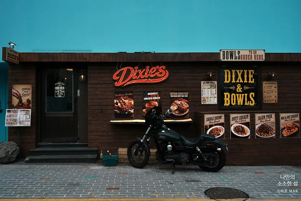 Menu board listing the Dixie & Bowl items