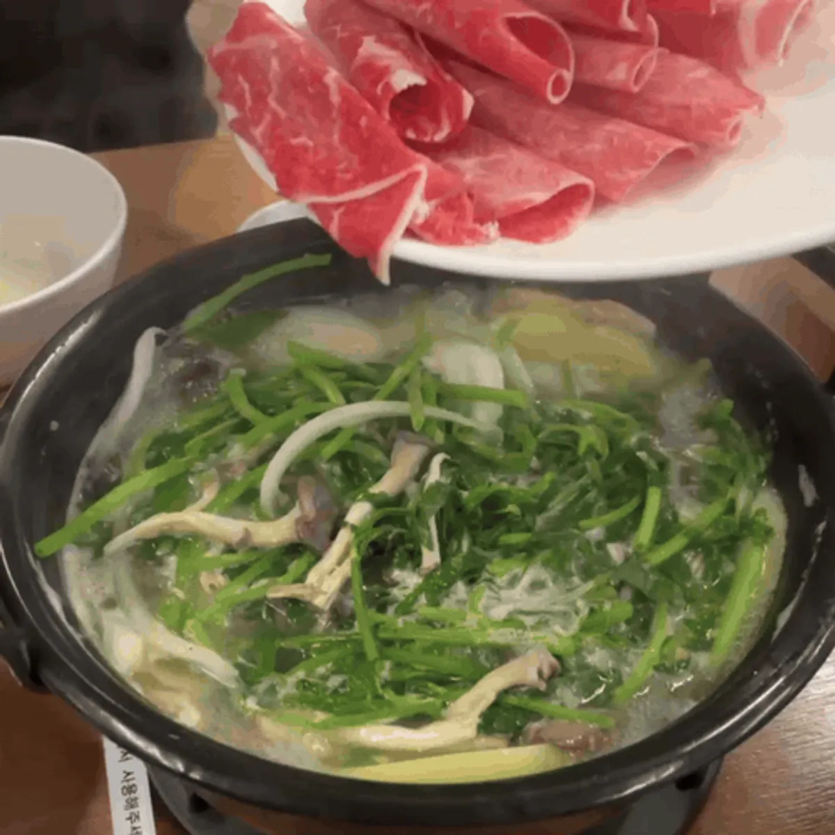 Shabu beef briefly dipped in the broth and pulled out