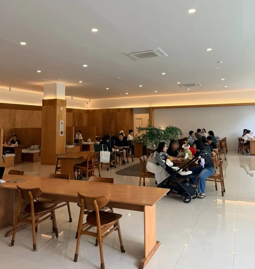 Wood-tone interior seating at Dobana