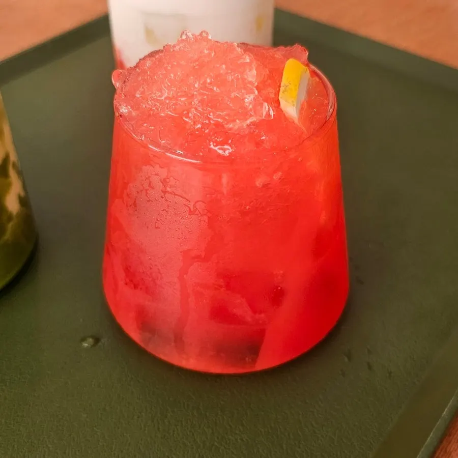 Strawberry latte with visible fruit pulp