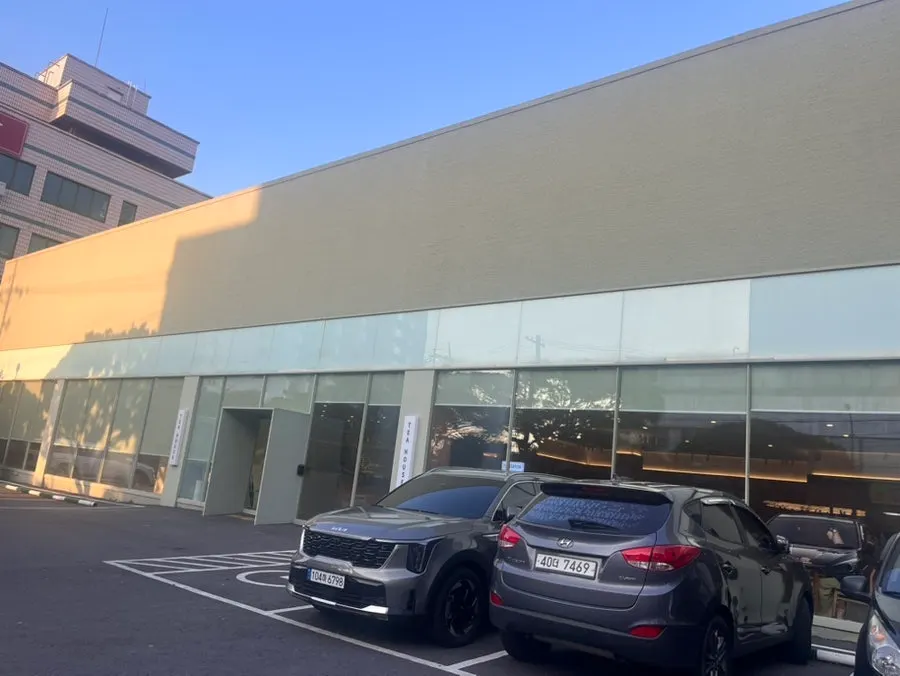 The large parking lot in front of Dobana Tea House