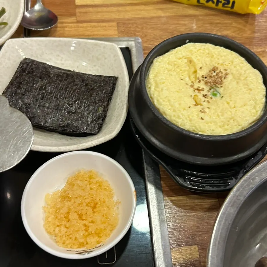 Table full of soy crab dishes