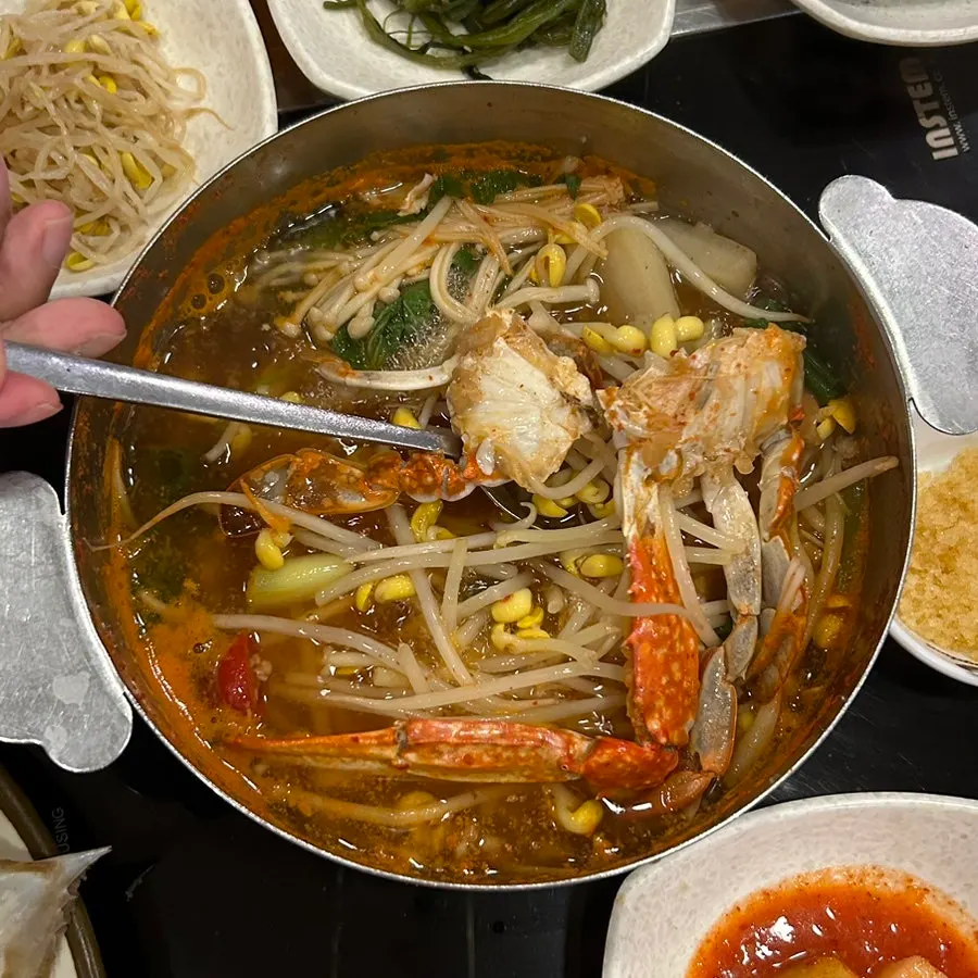 Crab stew with a whole crab inside