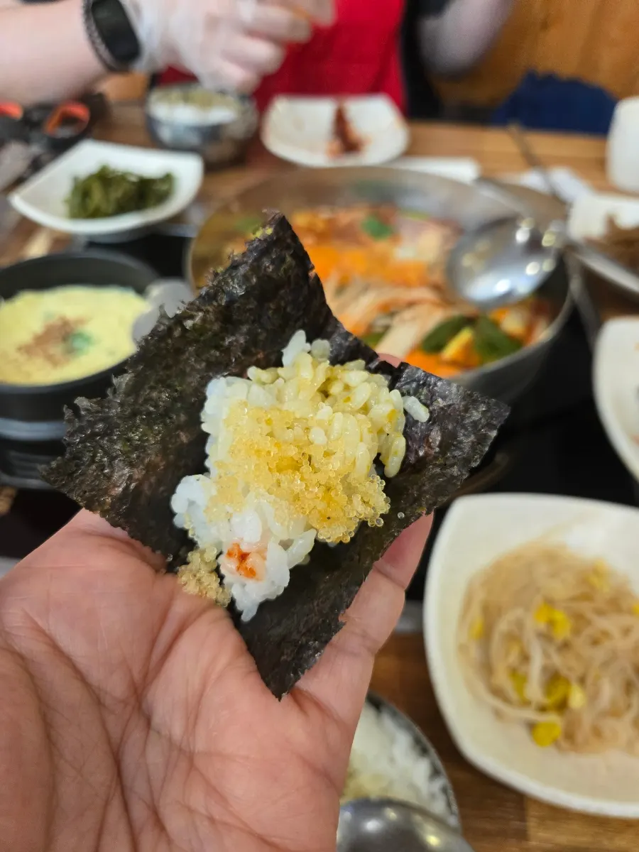 Crab shell rice topped with marinated crab sauce