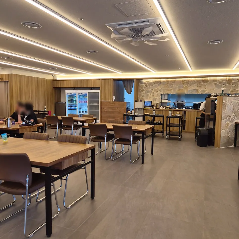 Dining hall with customers during lunch hour