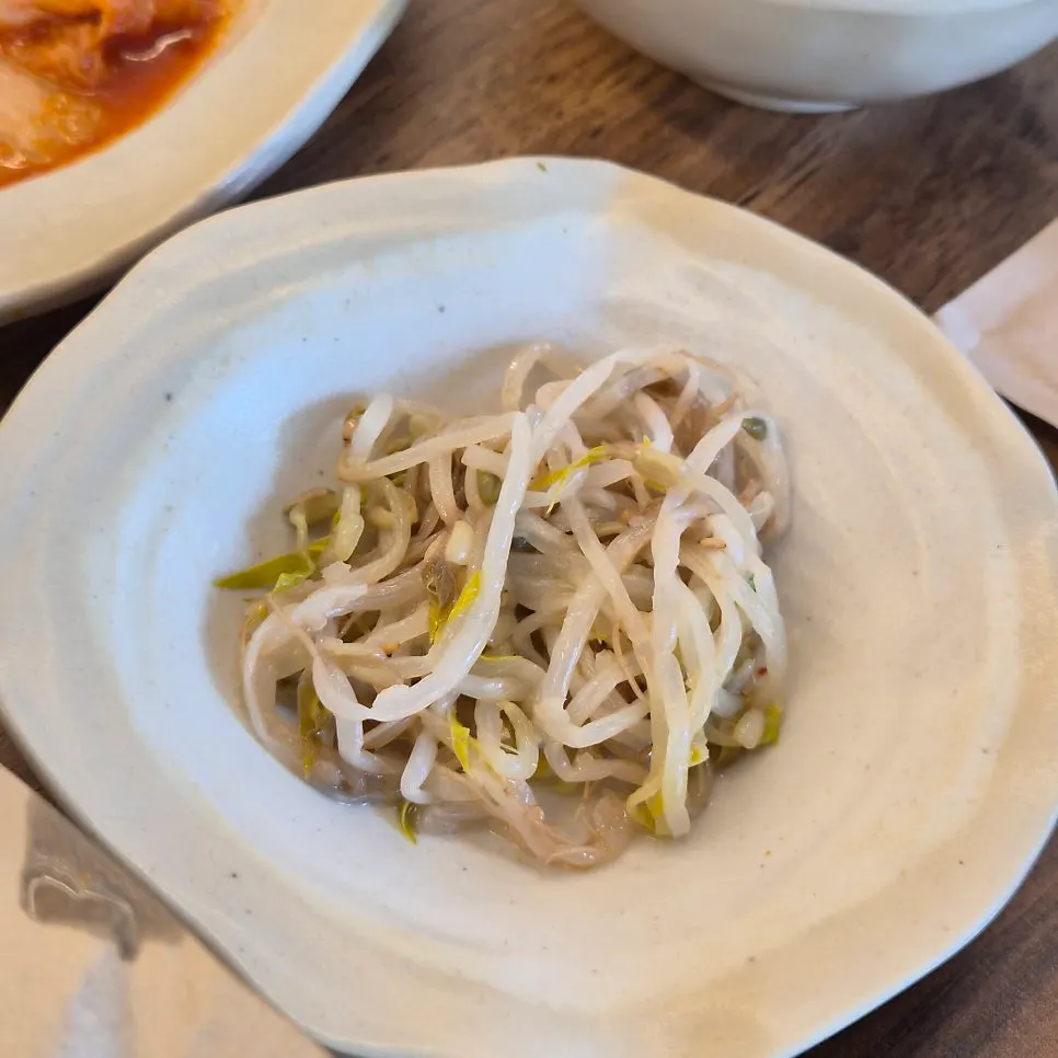 Side dish spread including doenjang jjigae