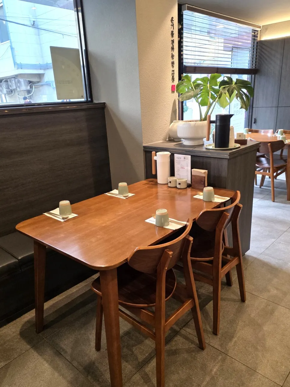 Basic table setting with barley tea, kimchi and kkakdugi