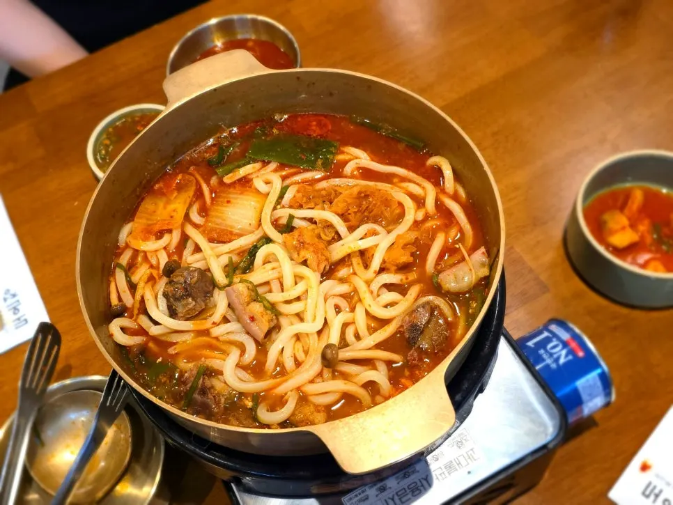 Udon noodles added to the hot pot