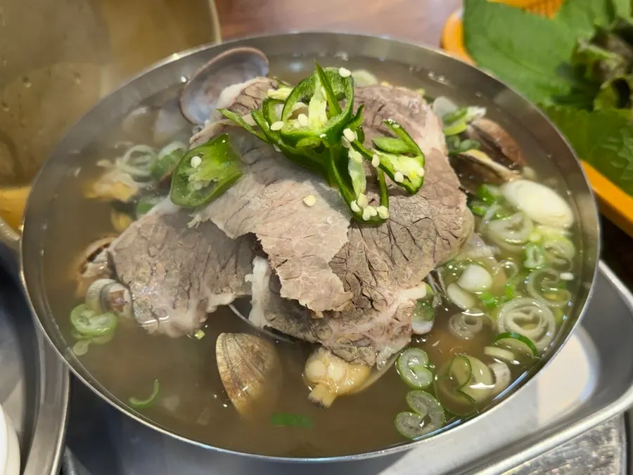 Clam beef soup piled high with clams