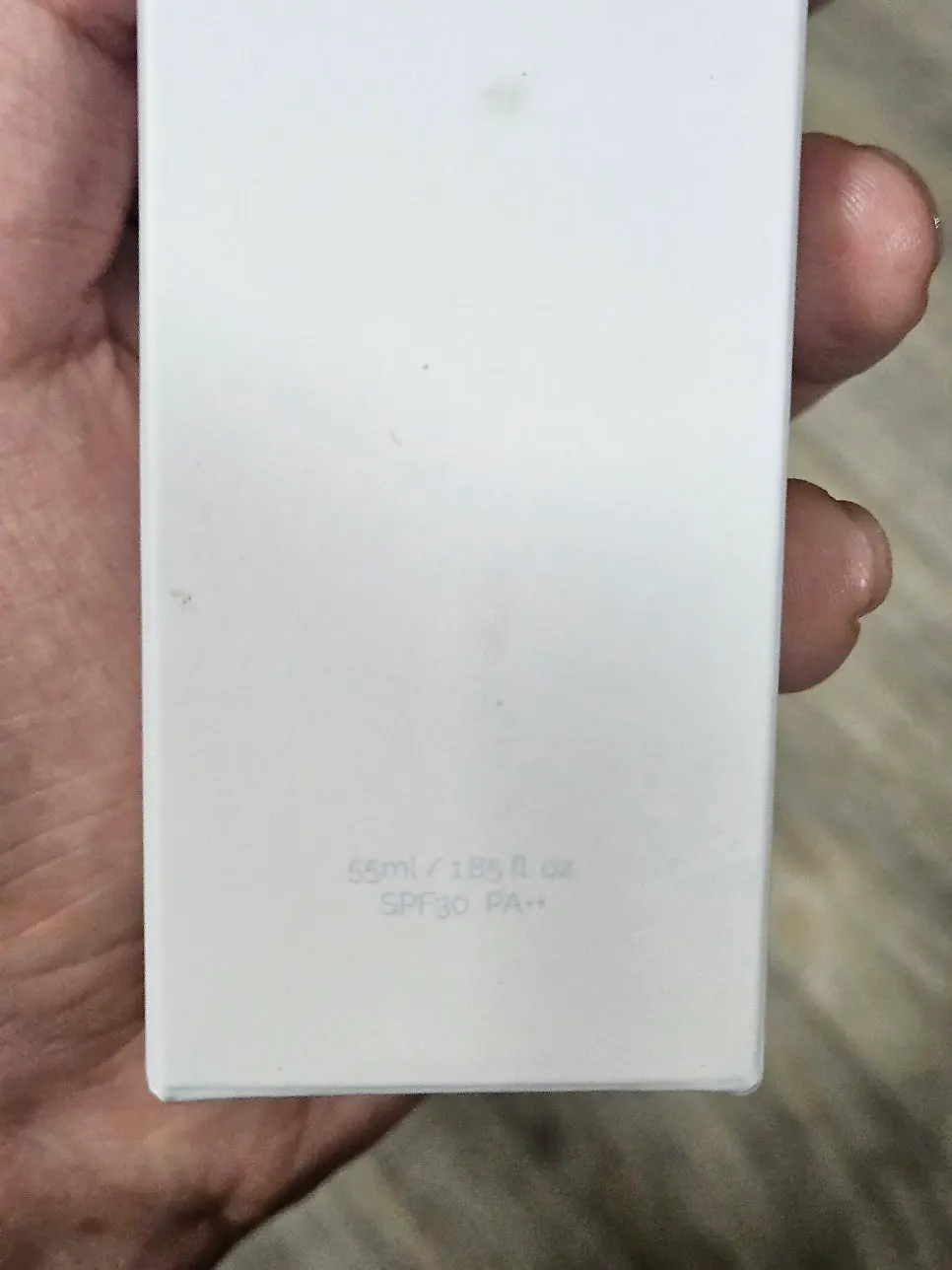 Tone-correcting lotion with sun protection