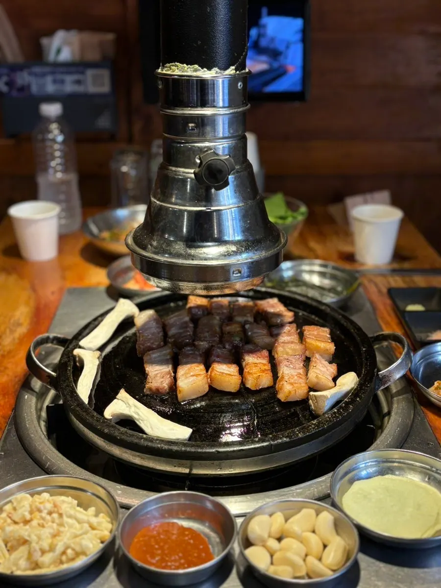 Cross-section of golden, well-grilled pork belly