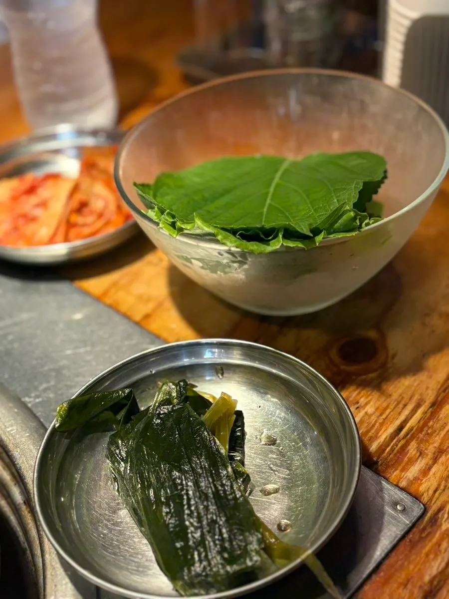 Table setting at the end of the meal at Dojeok Hapjeong
