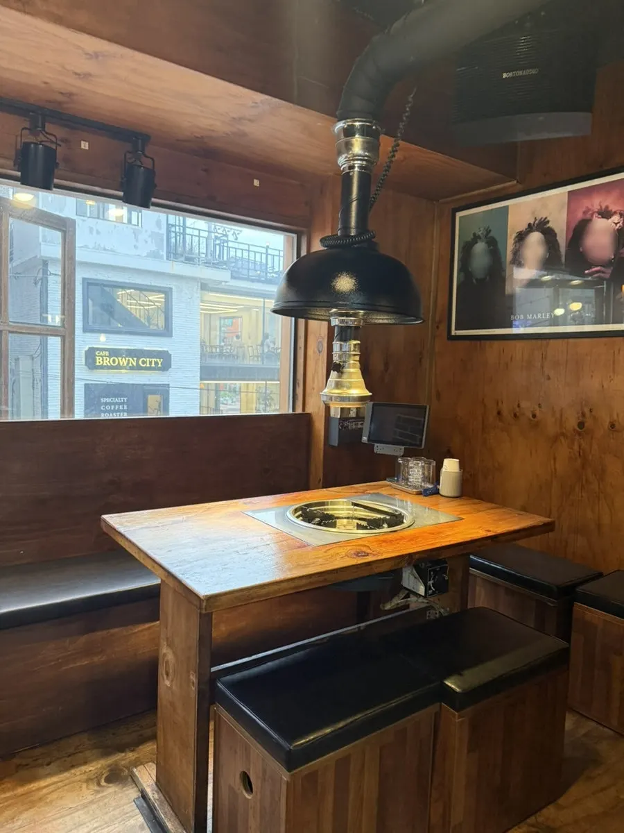 Interior decorated with wooden tables