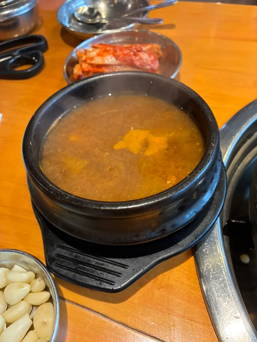 A spread of side dishes served with the meat