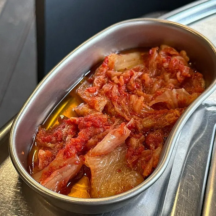 A small dish of spicy hairtail fish sauce