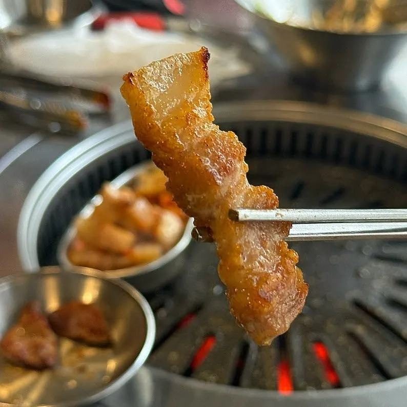 Grilled pork belly with the skin still attached