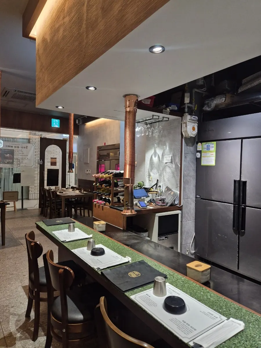 Seating and grill table at Ddeum Sukseong Hanwoo No.9