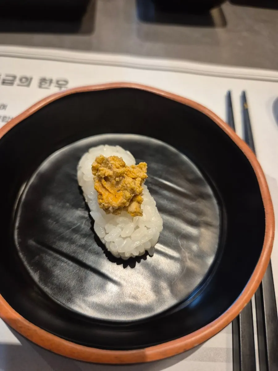 Anglerfish liver salad served over rice