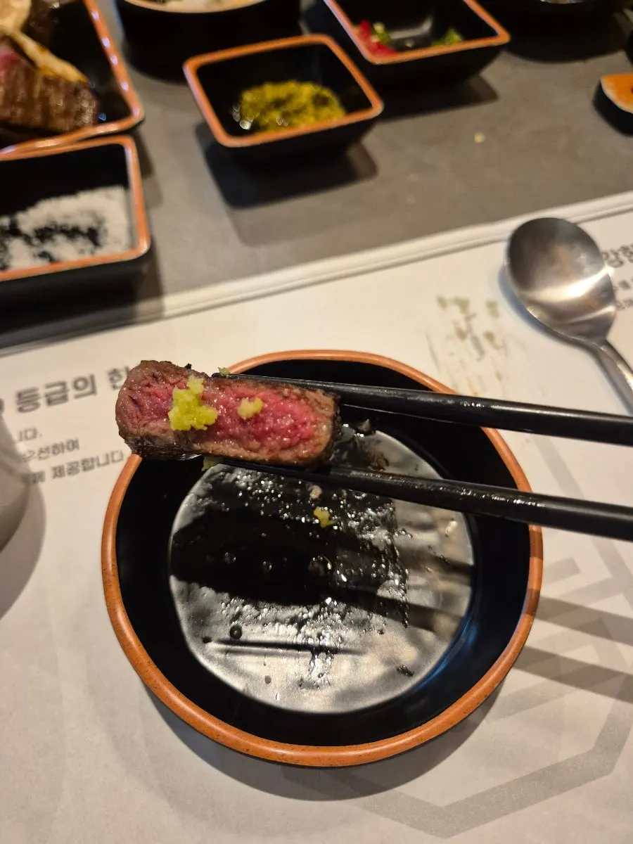 A neatly cut piece of grilled hanwoo