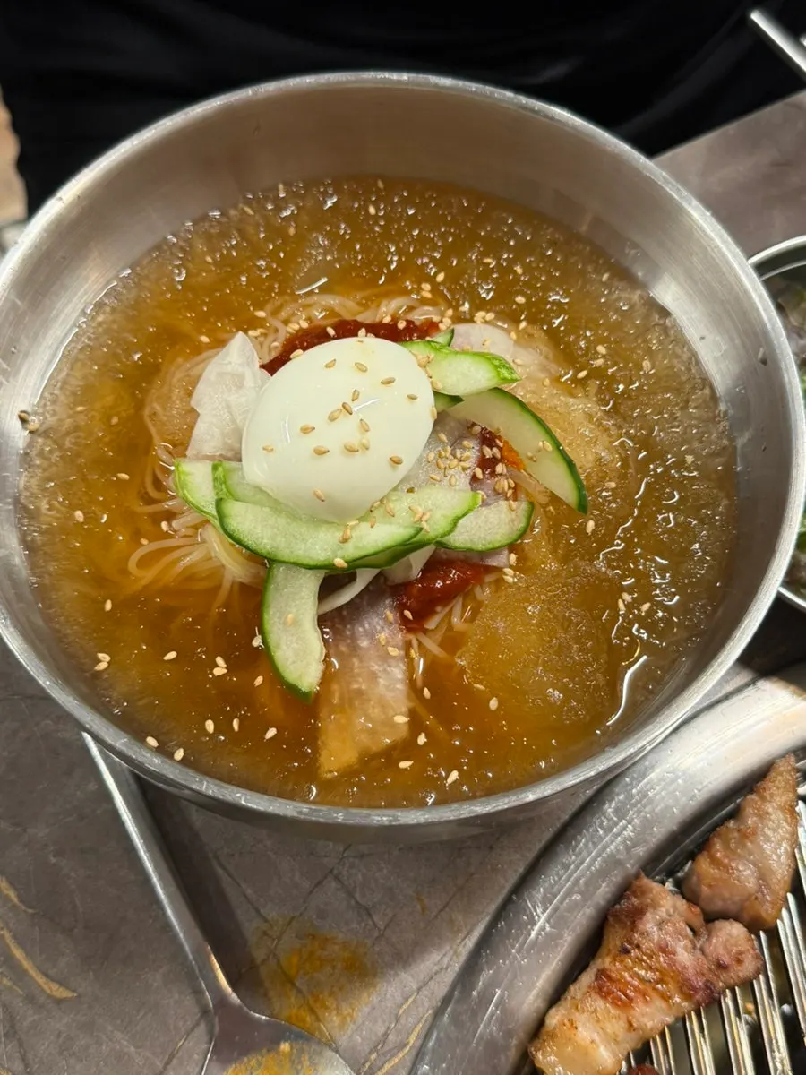 Tongsamgyeop served with side dishes