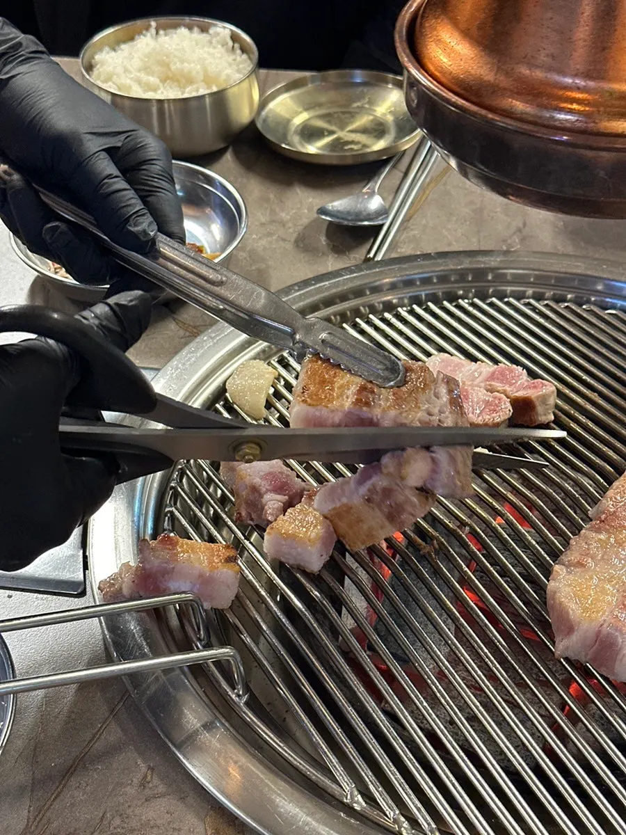 A well-grilled piece of whole pork belly