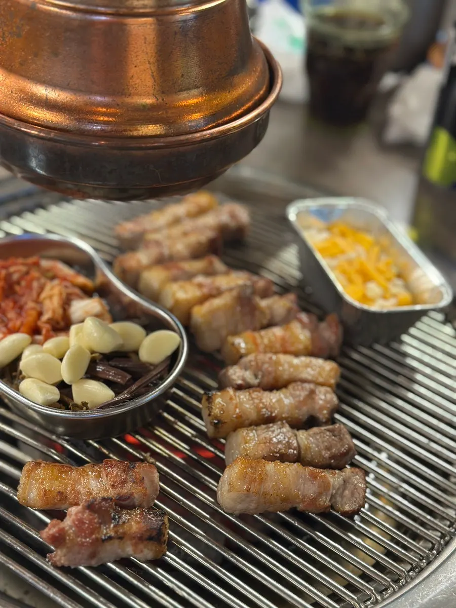 Whole pork belly wrapped in myeongi-namul