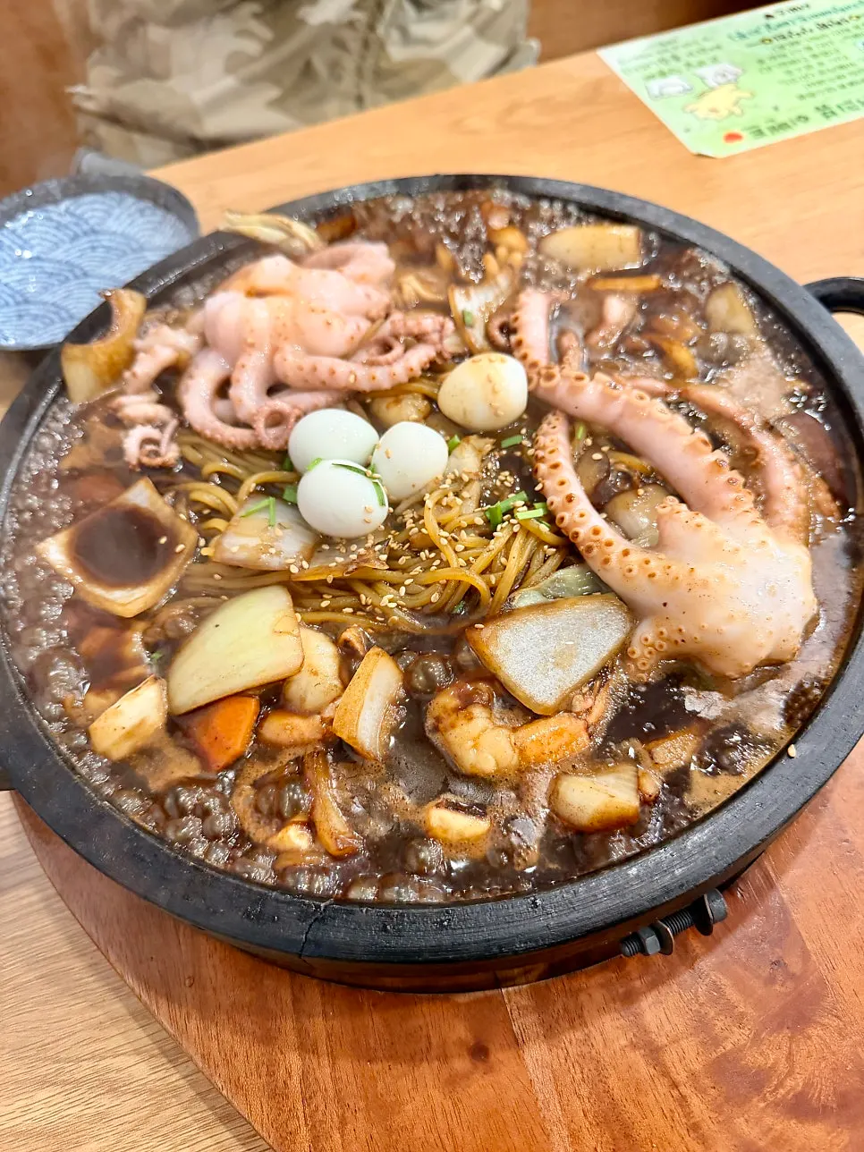Sizzling stone-plate jajang with octopus