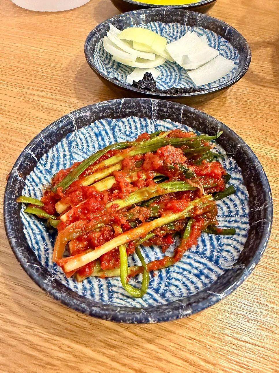 A bite of jajangmyeon well-coated in sauce