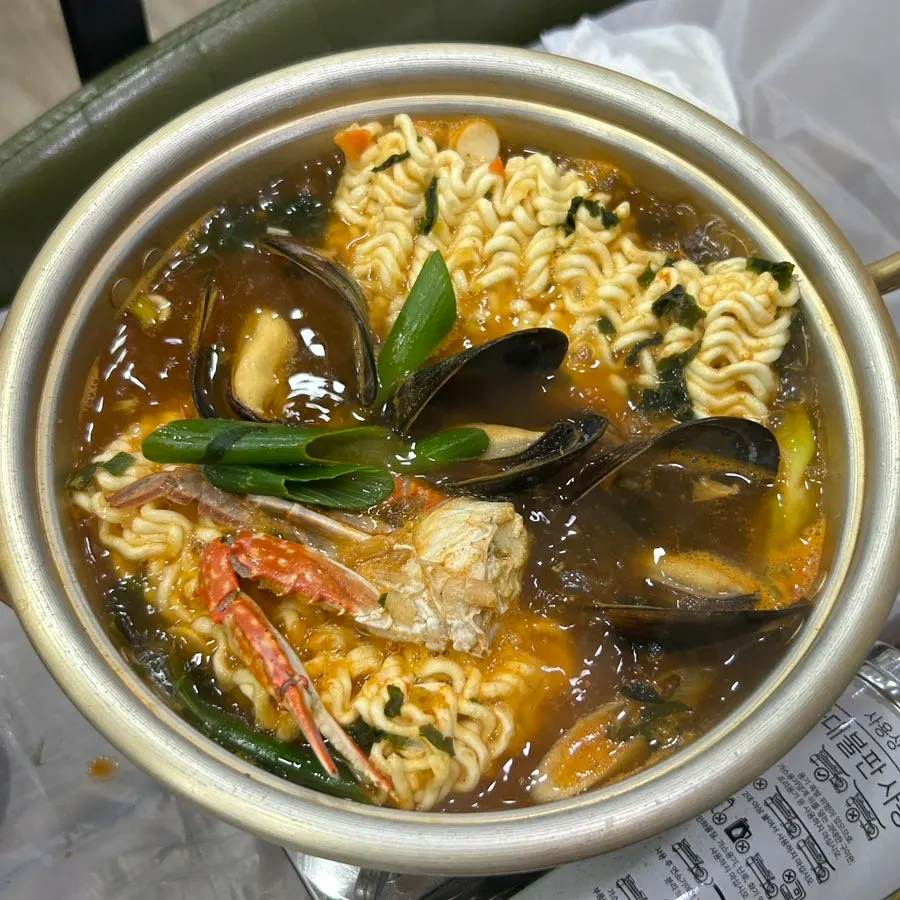 The red crab spread finished off with seafood ramyeon
