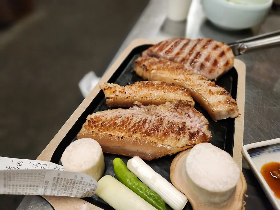 Pre-seared pork shoulder and snowflake pork belly served with vegetables