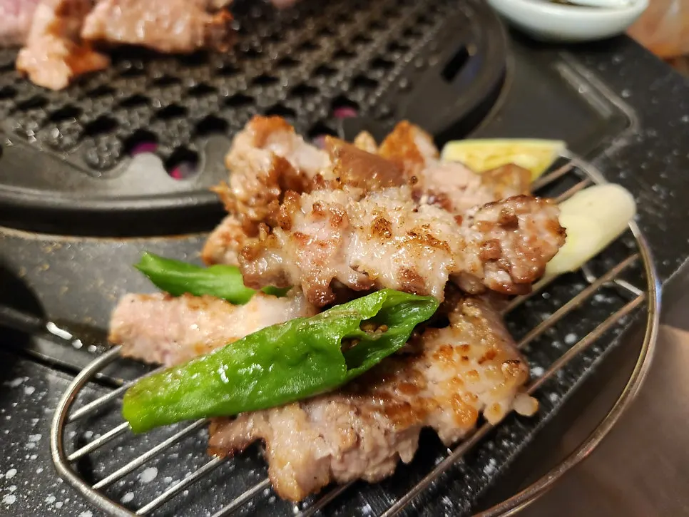 Grilled peppers and scallions served with the meat