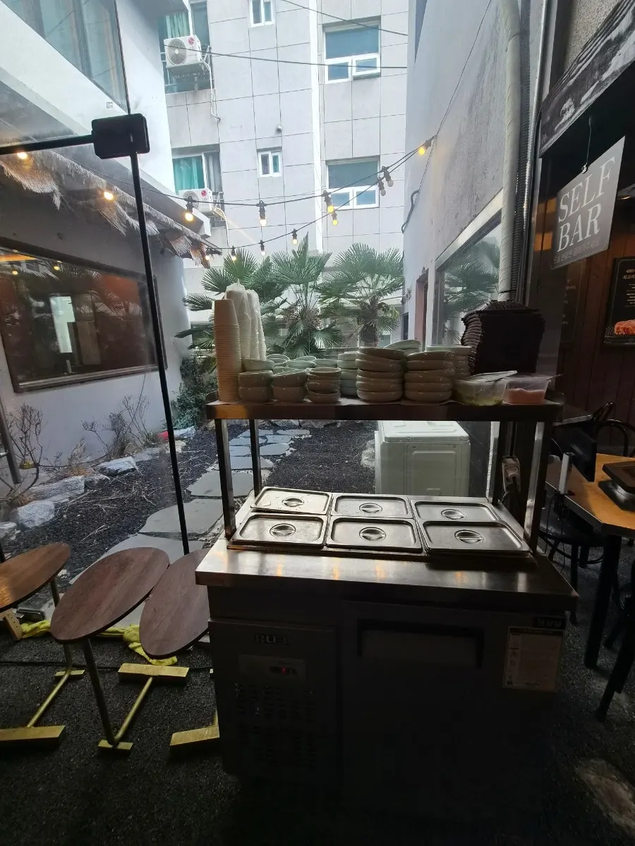 Basket of lettuce and garlic from the self-serve bar