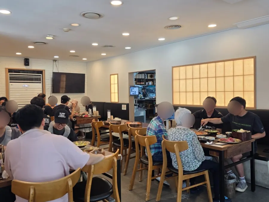 A table for 5-6 with kids' seating nearby